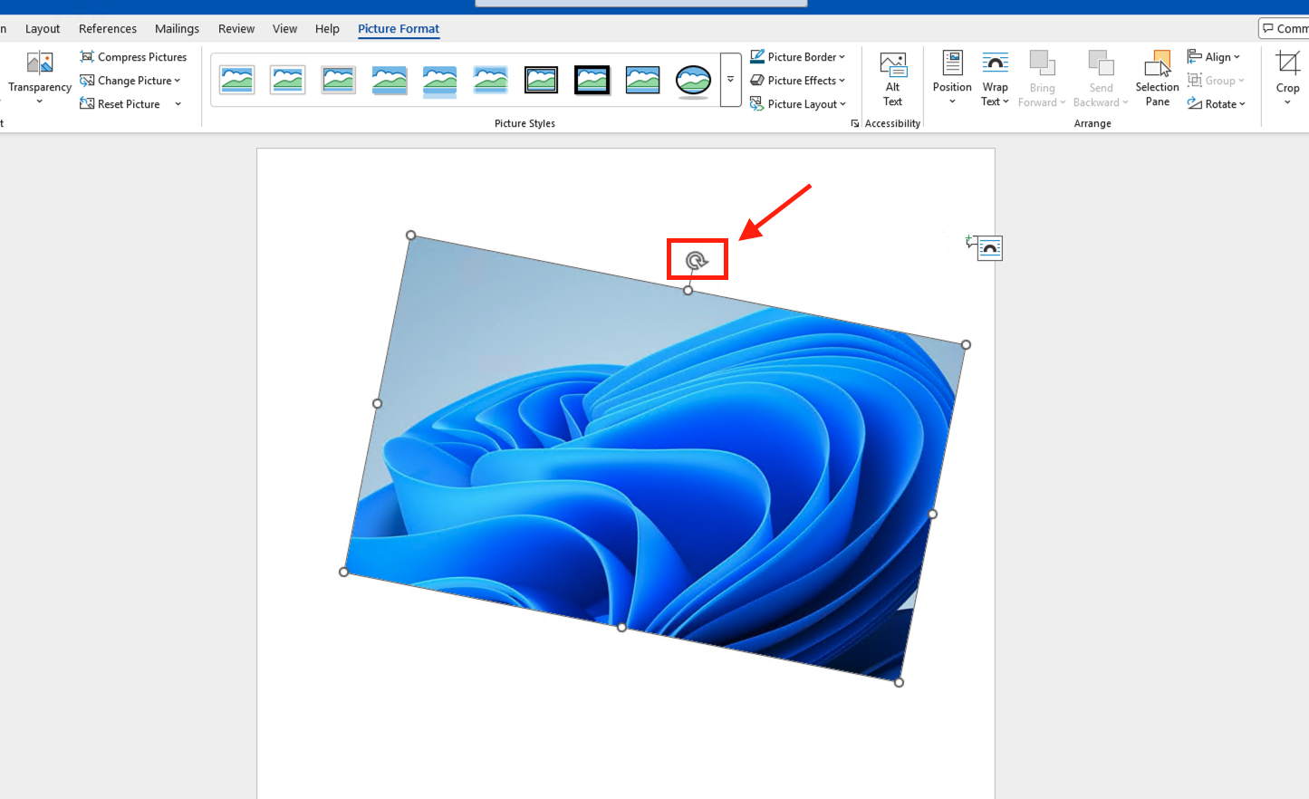 Cách xoay hình ảnh trong Word thủ công bằng biểu tượng xoay (Xoay tự do)